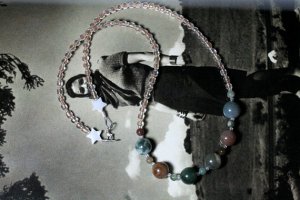 Perhaps something a little earthier like this Jasper and glass bead necklace